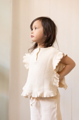 Joyful kids portrait series featuring soft textures, bold blue accents and contemporary minimal styling