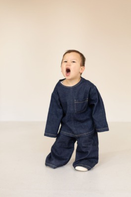 Joyful kids portrait series featuring soft textures, bold blue accents and contemporary minimal styling