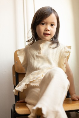 Joyful kids portrait series featuring soft textures, bold blue accents and contemporary minimal styling